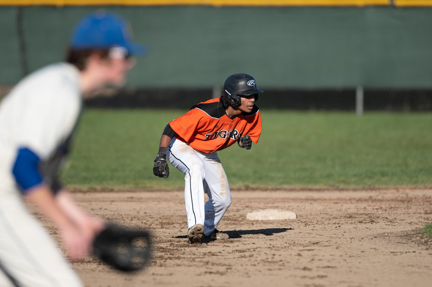 Centralia leadoff hitter Moshie Eport navigates the base path against Rochester March 22.