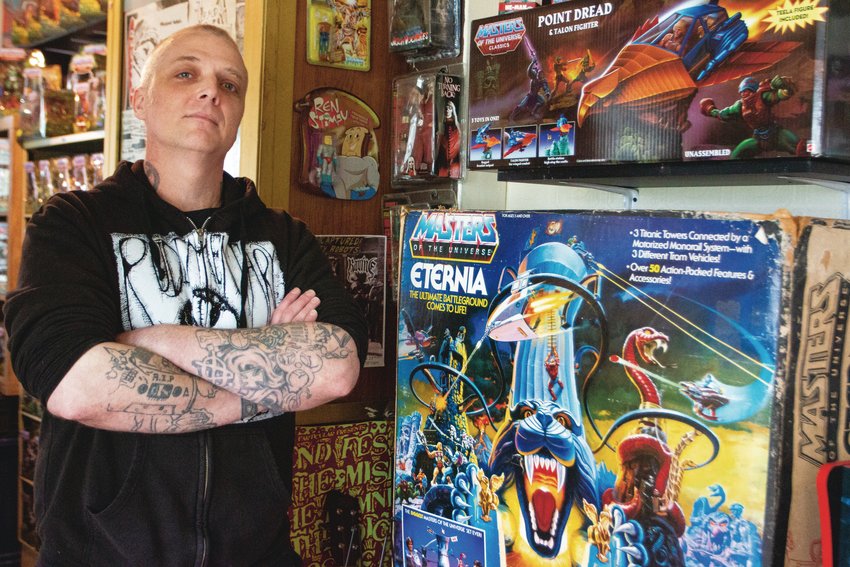 Zane Verley poses with one of his favorites in his collection, a vintage &ldquo;Masters of the Universe&rdquo; castle playset. This playset can be purchased at Walmart, but Verley has his hands on an original that was produced in the 1980s.