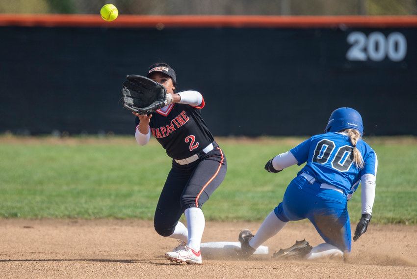 Napavine shortstop Makensee Taliaferro (2) prepares to catch a toss to second base during a home game against Toutle Lake on March 31.