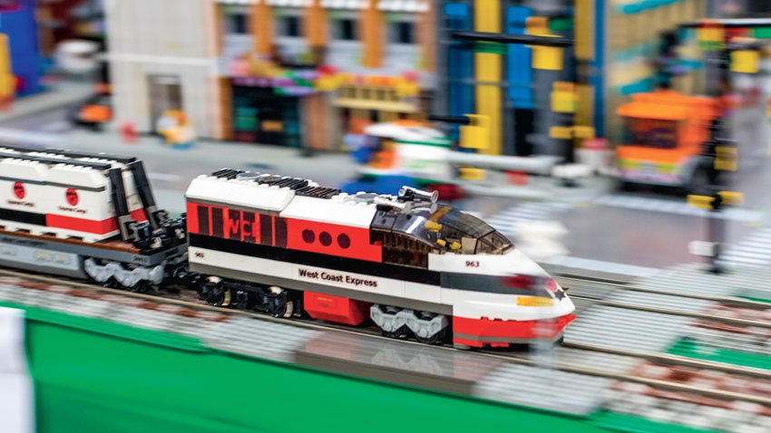A Lego train rolls down its track during the Lewis County Model Railroad Club&rsquo;s biannual show and swap meet at the Southwest Washington Fairgrounds in 2022.