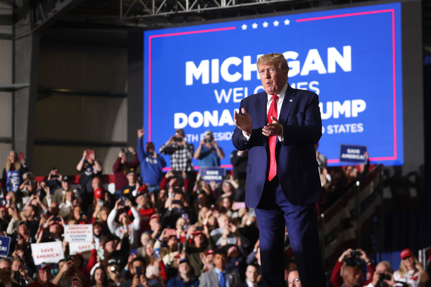 Former President Donald Trump arrives at a rally on April 2, 2022, near Washington, Michigan. (Scott Olson/Getty Images/TNS)