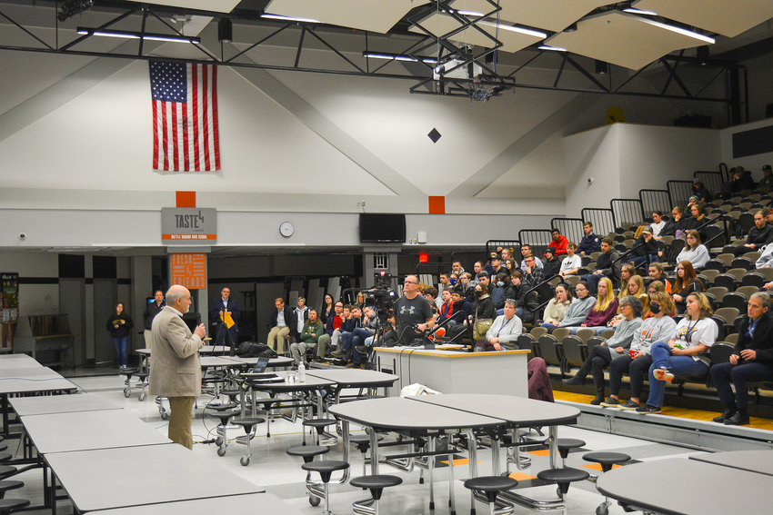 Peter Metzelaar, a Holocaust survivor, speaks to students at Battle Ground High School on April 14.