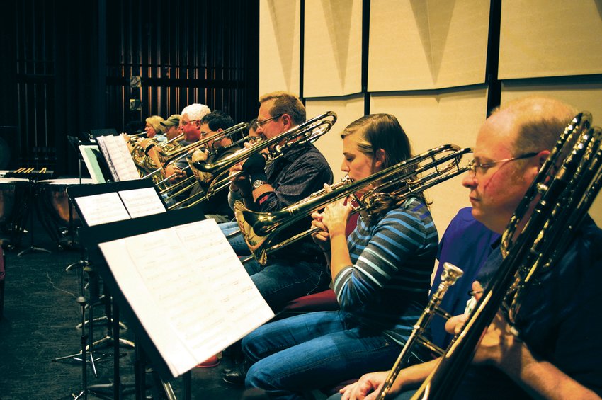 Northwest Wind Symphony musicians perform during a previous concert in this Chronicle file photo.