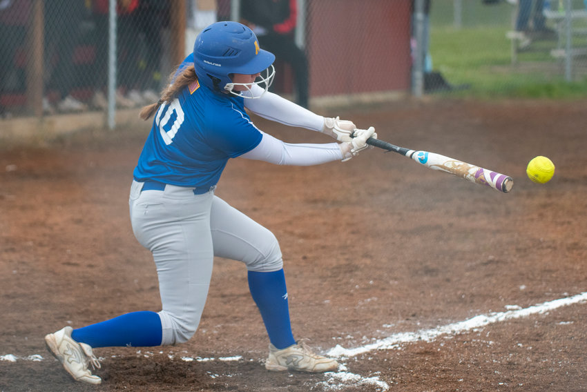 Adna's Ashlee VonMoos connects on a Winlock pitch during a road game on April 20.