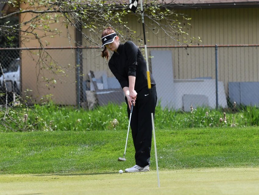 Tumwater senior Chloe Staudt putts the ball on the ninth hole at Mint Valley Golf Course on April 27, at the Cowlitz Invitational.