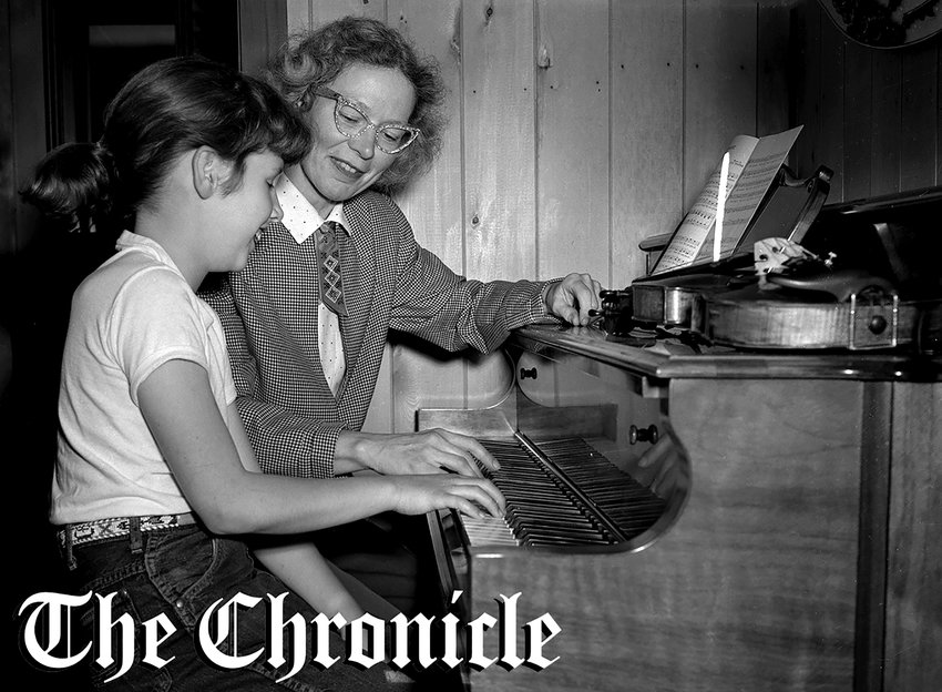 From the May 1958 Chronicle archives: &ldquo;MUSICAL POINTERS on the piano are given by Mrs. Robert Baker, Packwood, a retired concert artist, to her daughter, Joan, 10. Mrs. Baker gave up professional music to live in Packwood. On piano at right is 1567 violin which Mrs. Baker used in concert performances. - Chronicle Staff Photo.&rdquo;