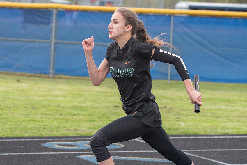 Morton-White Pass' Jordan Koetje sprints as the Timberwolves' anchor in the 4x100 relay at the Pirate Classic on May 3.