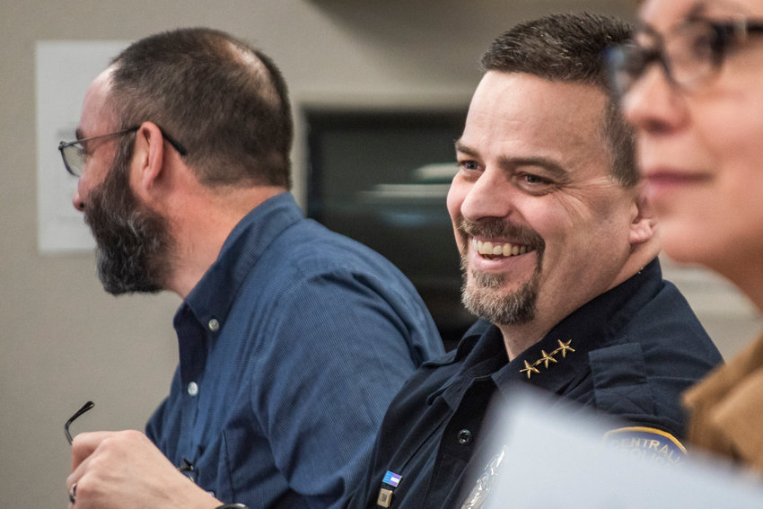 Centralia Police Chief Stacy Denham laughs during a meeting about Interstate 5 closure planning at the Lewis County Courthouse last May.