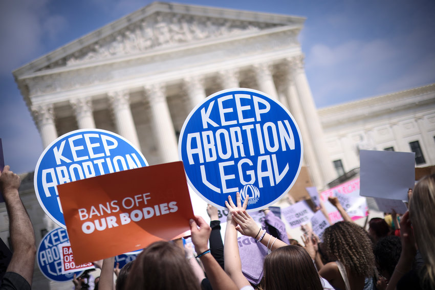 Pro-choice and anti-abortion activists demonstrate in front of the Supreme Court Building on May 3, 2022, in Washington, D.C. (Win McNamee/Getty Images/TNS)
