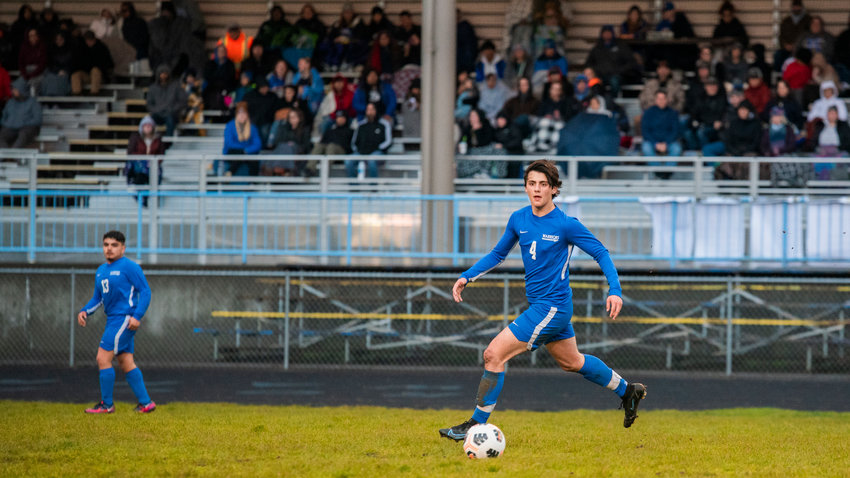 Rochester&rsquo;s Gabriel Stuard (4) looks upfield to pass during a game on Thursday.