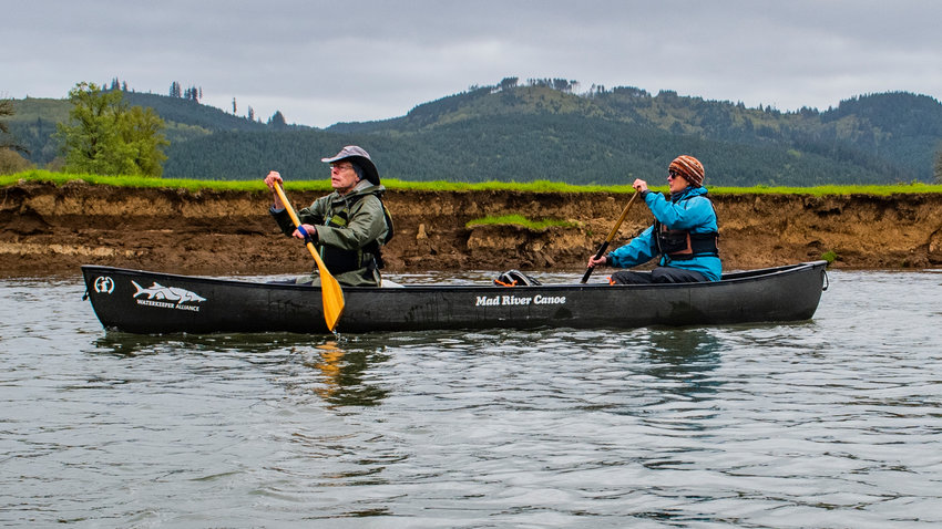 Lee First, an environmental activist, and geomorphologist Paul Bakke paddle the Chehalis River during a trip with Chronicle journalists Isabel Vander Stoep and Jared Wenzelburger Tuesday.