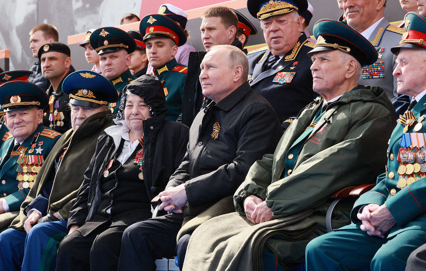 Russian President Vladimir Putin watches the Victory Day military parade at Red Square in central Moscow on May 9, 2022. - Russia celebrates the 77th anniversary of the victory over Nazi Germany during World War II. (Mikhail Metzel/Sputnik/AFP via Getty Images/TNS)