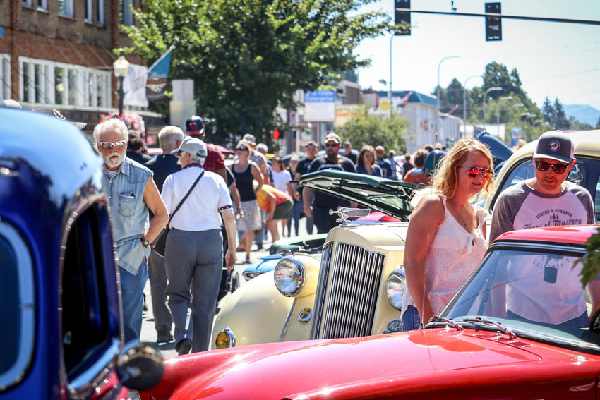 Crowds gather to see the Hub City Car Show in the streets of downtown Centralia in 2018. The Lewis County Quarter Milers and the Centralia-Chehalis Chamber of Commerce traditionally present the Hub City Car Show along Tower Avenue every year, though it was moved due to the pandemic the last two years. The event&rsquo;s history stretches back to the 1940s when the Quarter Milers were a club that got together to race their hot rods at the Toledo Airport.