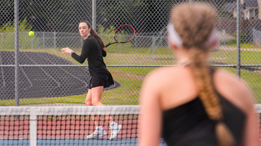 Claire Kuykendall, first singles player for W.F. West, prepares to return a shot during a match at A.G. West Black Hills High School Tuesday afternoon in Tumwater.