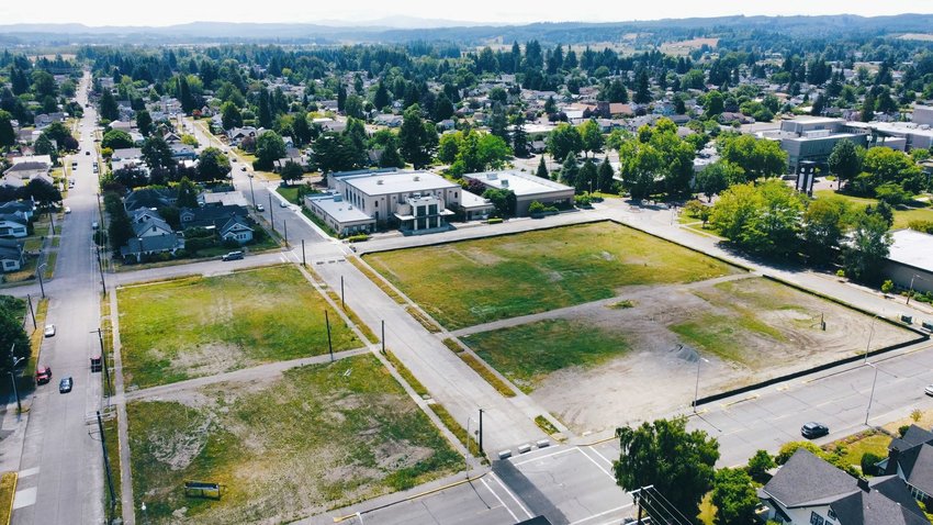 FILE PHOTO &mdash; South Silver Street, left, and South Iron Street, middle, run south in this aerial view of the site where Centralia College&rsquo;s athletic complex is set to be built. The college&rsquo;s gymnasium sits in the top center of the photo. The new turf complex will house a baseball field, softball field and an NCAA-sized soccer pitch.