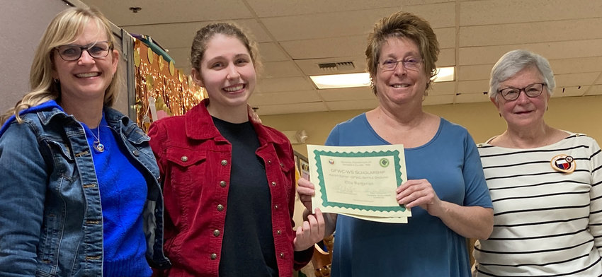 Ellie Durgarian receives official documentation for the $6,500 in GFWC scholarships from chairman Leese Pohl on May 12. On the left is Durgarian&rsquo;s mother, Renee, and on the right is Mary Lee Miller, club president.