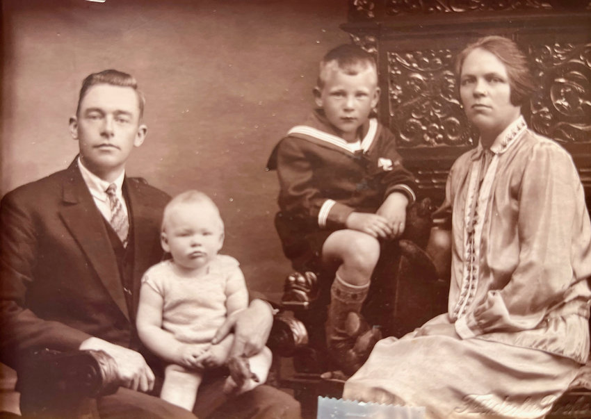 Family portrait about 1930 from left, father Willem Klijnsma holding Grietje (Grace), brother Gosse,  and mother Atje Van Wyngaarden Klijnsma before the youngest girl was born