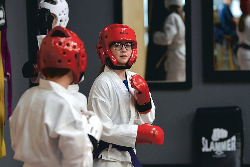 A student during the 5 p.m. class practices live sparring at Rainier Martial Arts.