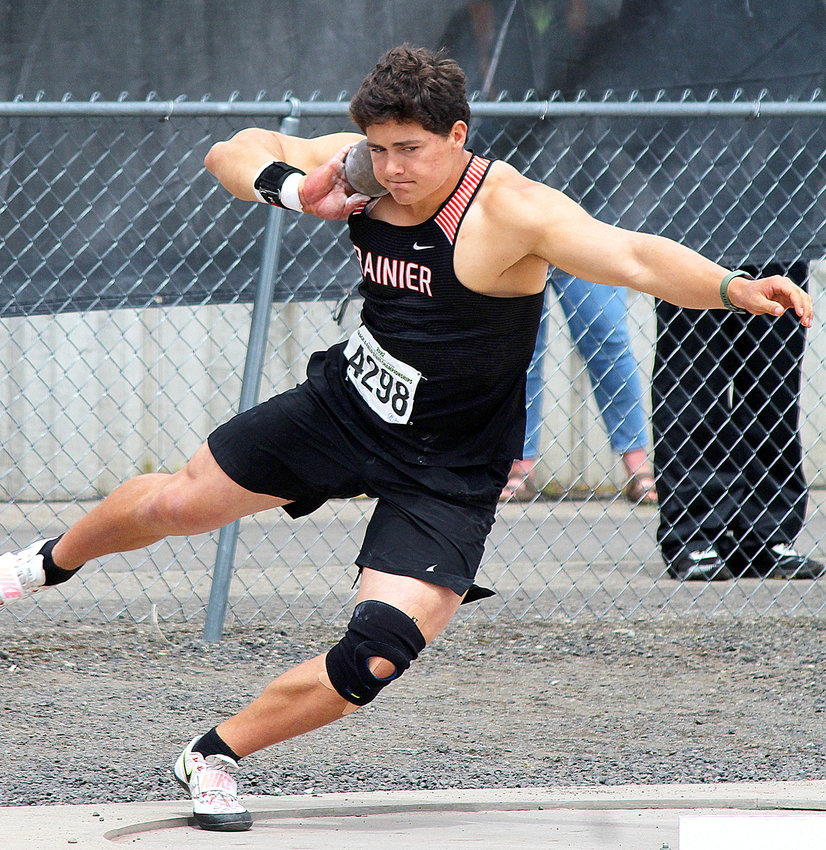 Rainier's Jeremiah Nubbe throws the shotput during the State 1B/2B/1A Track and Field Championships in Cheney on Friday, May 27, 2022.