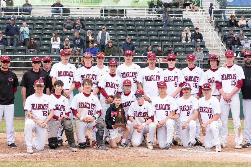 The W.F. West baseball team poses with the third-place trophy after defeating Ellensburg, 9-6, in the 2A State Baseball Tournament May 28 at Yakima County Stadium.