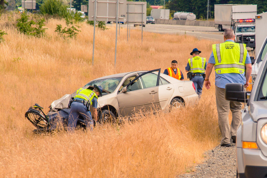 Washington State Patrol responds to the scene of a fatal crash on the southbound exit ramp of Interstate 5 at milepost 88 near Grand Mound in July 2021.