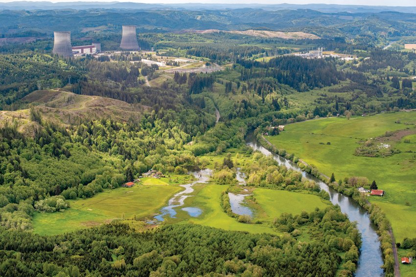 The Chehalis River flows past the Satsop Business Park on Friday, May 20, 2022.