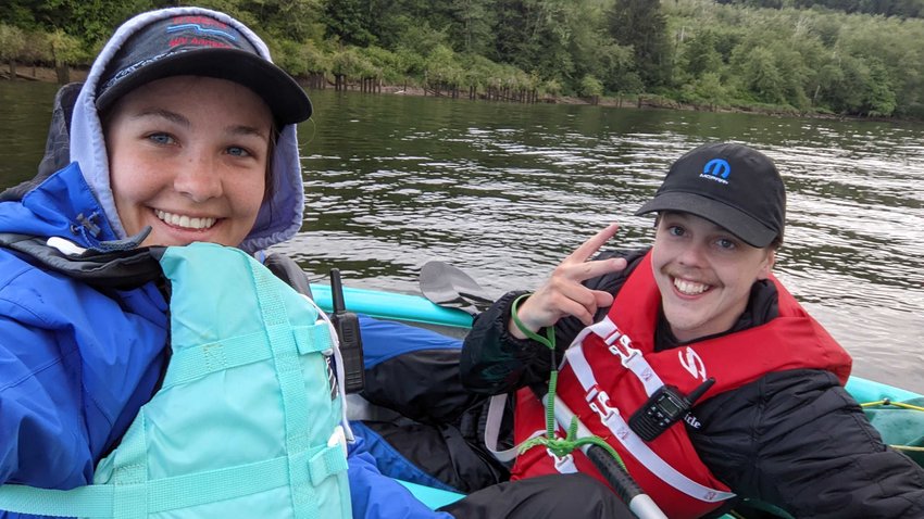 Reporter Isabel Vander Stoep and photographer Jared Wenzelburger smile while completing the Headwaters to Harbor series for The Chronicle last May.