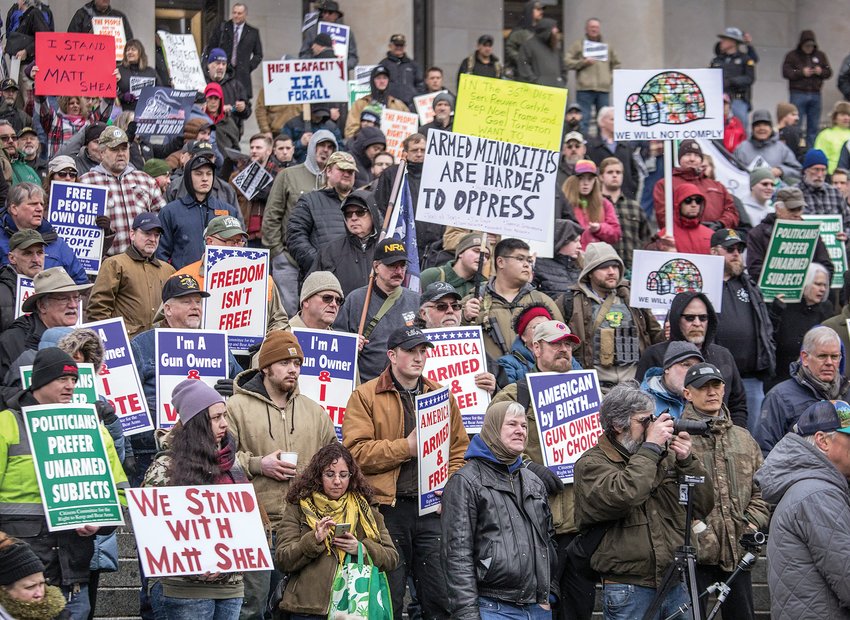 A gun-rights rally gets underway as people gather on the steps of the Capitol building in Olympia, Washington, on Jan. 17, 2020. (Steve Ringman/Seattle Times/TNS)