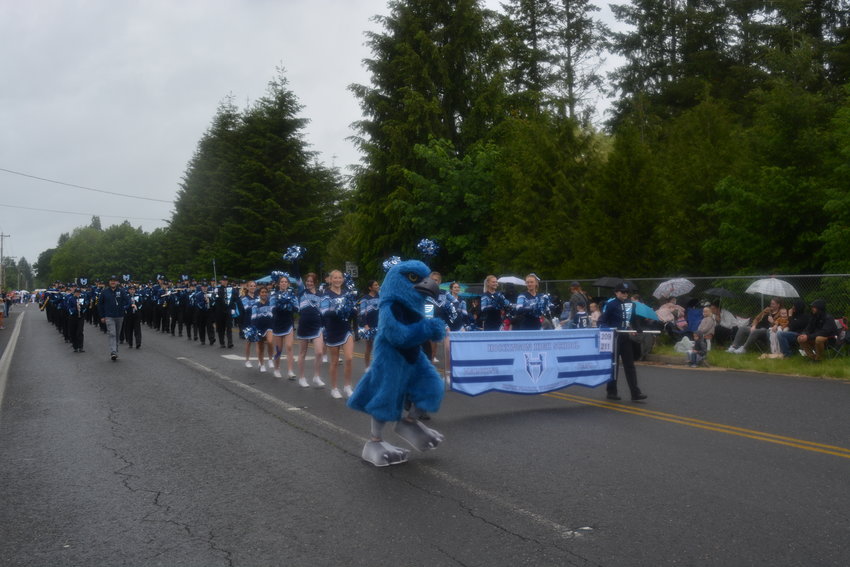 The Hockinson High School band kicks off the Fun Days parade, guided by the school&rsquo;s hawk mascot on June 4.