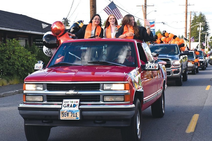 Rainier&rsquo;s Class of 2021 parades through downtown Rainier on June 4, 2021. Rainier High School will once again hold a parade for its graduates on June 10 following the school&rsquo;s commencement ceremony.