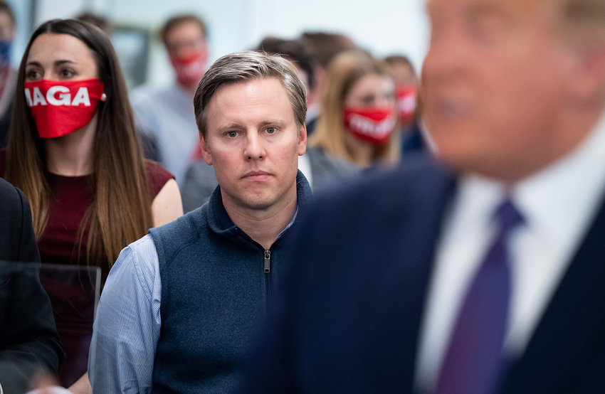 Campaign Manager Bill Stepien listens as US President Donald Trump visits his campaign headquarters in Arlington, Virginia, Nov. 3, 2020. (Saul Loeb/AFP via Getty Images/TNS)