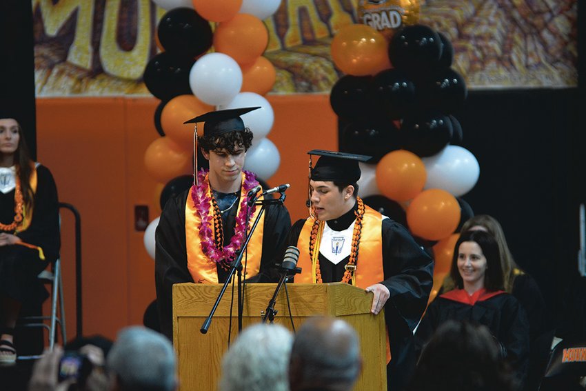 Masters of Ceremony Sean Mahaffey and David Cano address those in attendance prior to the graduation ceremony at Rainier High School on June 10.