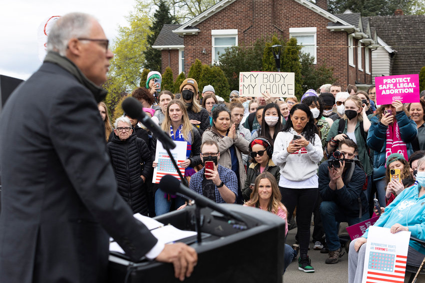 Washington state Gov. Jay Inslee speaks to media and people gathered at Kerry Park about patients' rights to abortion and reproductive healthcare during a pro-choice rally on May 3, 2022, in Seattle. (Jason Redmond/AFP/Getty Images/TNS)