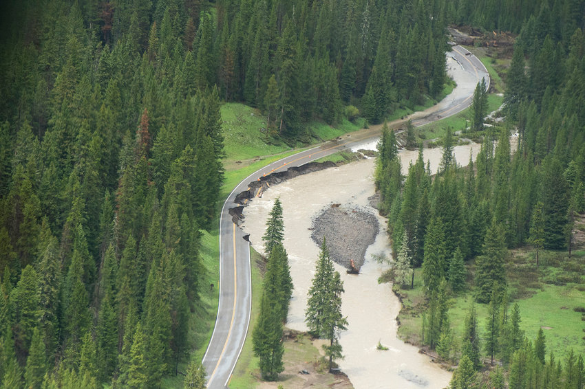 Northeast Entrance Road is shown severely damaged following historic flooding in Yellowstone National Park that forced it to shut down last week, June 19, 2022, in Gardiner, Montana. (Samuel Wilson/Pool/Getty Images/TNS)