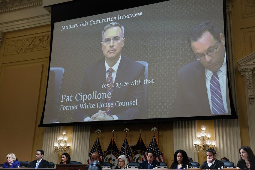 Pat A. Cipollone, who served as White House counsel for President Donald J. Trump, appears on a video screen above members of the Select Committee to Investigate the Jan. 6 Attack on the U.S. Capitol during the seventh hearing on the January 6th investigation in the Cannon House Office Building on July 12, 2022, in Washington, DC. The bipartisan committee, which has been gathering evidence for almost a year related to the January 6 attack at the U.S. Capitol, is presenting its findings in a series of televised hearings. (Anna Moneymaker/Getty Images/TNS)
