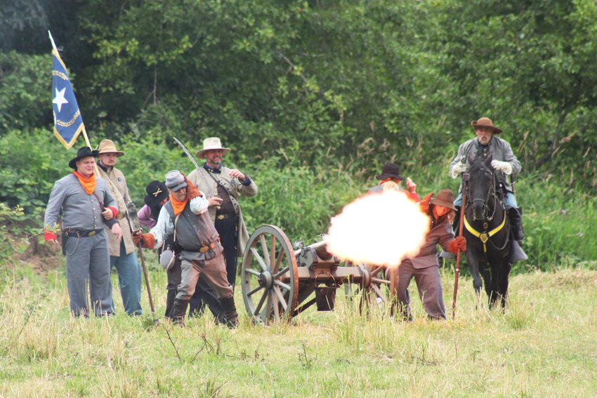 Confederate troops fire a canon during an American Civil War battle reenactment in Chehalis on Sunday. Named the &ldquo;Battle of Chehalis River,&rdquo; the reenactment was held Saturday and Sunday at 313 Tune Road. It was hosted by the Washington Civil War Association. &ldquo;Come to beautiful rural Lewis County, just south of Chehalis, and experience the sites, sounds and smells of the American Civil War, the bloodiest war in American history. The men, women and children of the Washington Civil War Association invite you to step back into time to a different world,&rdquo; the association wrote prior to the event. &ldquo;You will be educated and entertained by civilians from many walks of life: cavalrymen with their horses,  artillerymen with their imposing cannon and infantrymen with a  wide variety of rifles and revolvers. Get up close and personal to a battle reenactment. Visit  the camps and speak to the living historians who love to share their history. Observe various demonstrations that will bring the 1860s to life.&rdquo;  The association&rsquo;s next local event will be the &ldquo;Battle for Klickitat Creek&rdquo; in Mossyrock on Aug. 6. Learn more at www.wcwa.net.