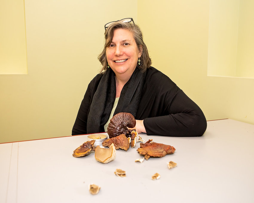 Dr. Lorinda Sorensen, of Battle Ground Healing Arts, displays a variety of mushrooms.