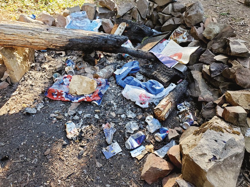 The Gifford Pinchot Trash Force provided this photograph of a scene left behind by campers that was discovered by volunteers during a recent cleanup event.