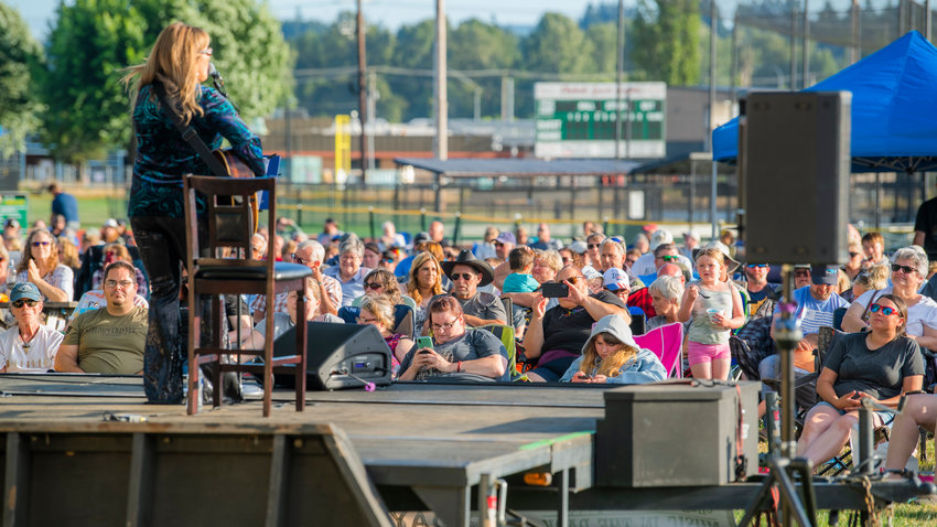 Michelle Wright looks out to the crowd during a Music in the Park event in Chehalis Friday evening.
