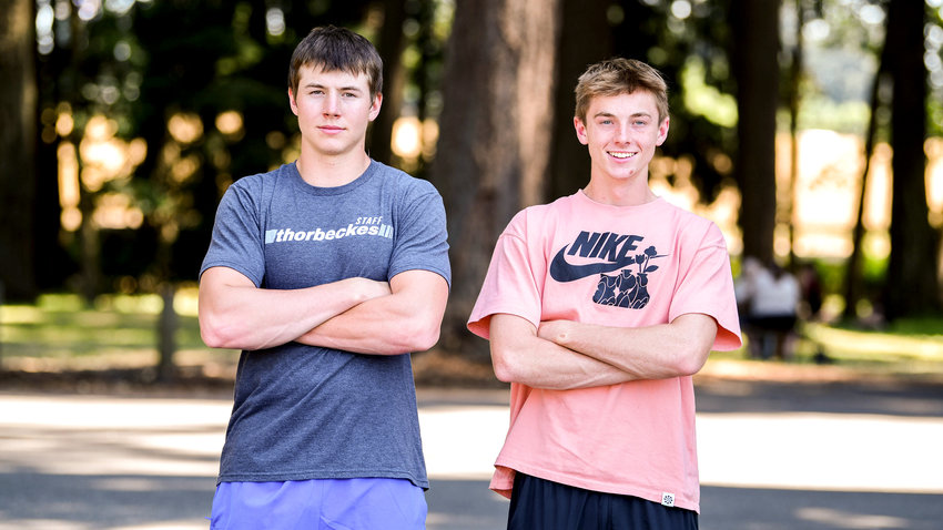 Carson and Connor Olmstead pose for a photo outside Thorbeckes in Centralia on Friday.