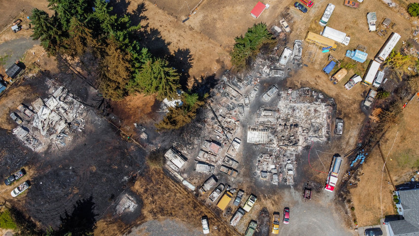 Devastation from a fire is seen from above along 195th Avenue Southwest in Rochester on Sunday.
