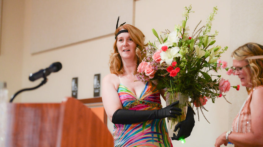 Centralia Mayor Kelly Smith Johnston reacts as she is named &ldquo;Woman of Distinction,&rdquo; during a Power of the Purse event held Tuesday at Jester&rsquo;s Auto Museum in Chehalis.