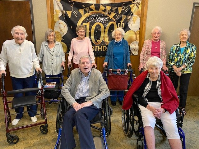 Woodland Village&rsquo;s eight centenarians. Back, from left to right: Louise Carpenter, 100; Agnes Wasson, 101; Dottie Docherty, 100; Eileen Wikokff, 101; Shirley Nelsen, 101 and Glenna Ralff, 100. Front: Jim Van Ackren (left), 100 and Pearl Miller, 103.