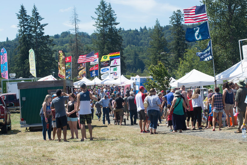 The crowd fills the main the drag of vendors at the Mossyrock Blueberry Festival in 2018.