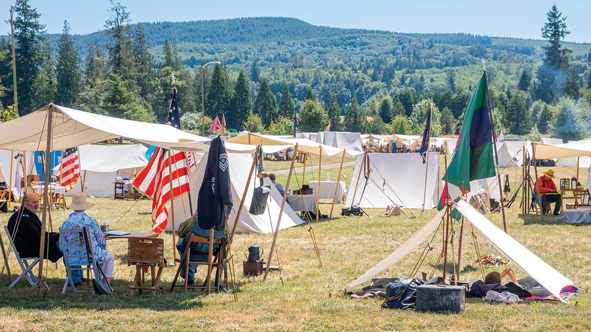 Civil War camp sites are seen during a living history reenactment in Mossyrock on Saturday. The Washington Civil War Association held its &ldquo;Battle for Klickitat Creek&rdquo; reenactment at the same time as the Mossyrock Blueberry Festival on Saturday and Sunday. The association reenacted battles and opened their camps up to attendees.