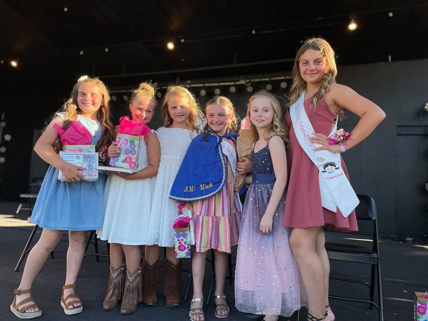 Emma Britton, a 9-year-old from Chehalis who attends Orin Smith Elementary School, has been named Little Miss Friendly at the SW Washington Fair. Emma comes from a friendly family: Her grandmother held the title many years ago. She&rsquo;s the one at center wearing the iconic cape.