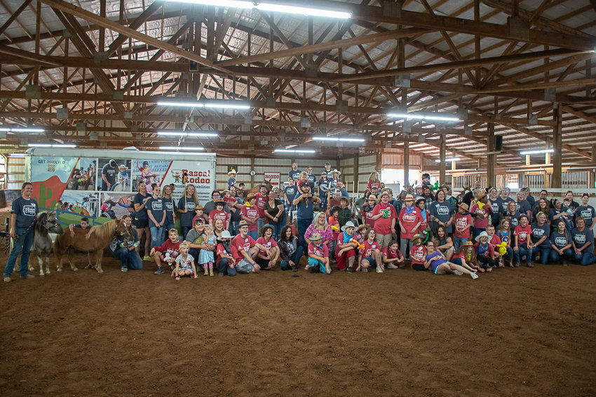 All of the participants and volunteers gathered for a group shot at the end of the Rascal Rodeo. Photo by Owen Sexton.
