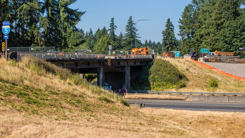 Construction equipment is pictured on the state Route 506 overpass on Tuesday afternoon.