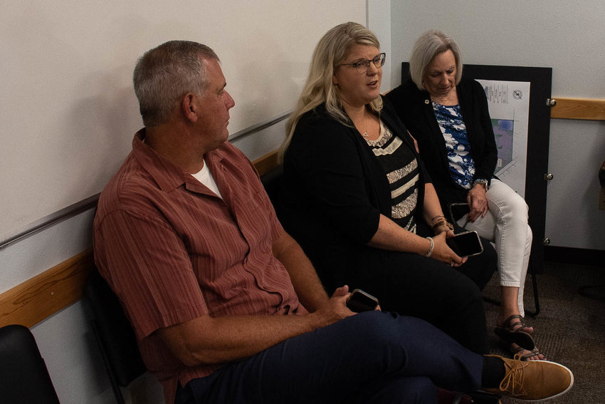 Experience Chehalis Director Annalee Tobey, center, talks about Experience Chehalis and Chehalis Coworks during a meeting of the Port of Chehalis commissioners on Thursday.