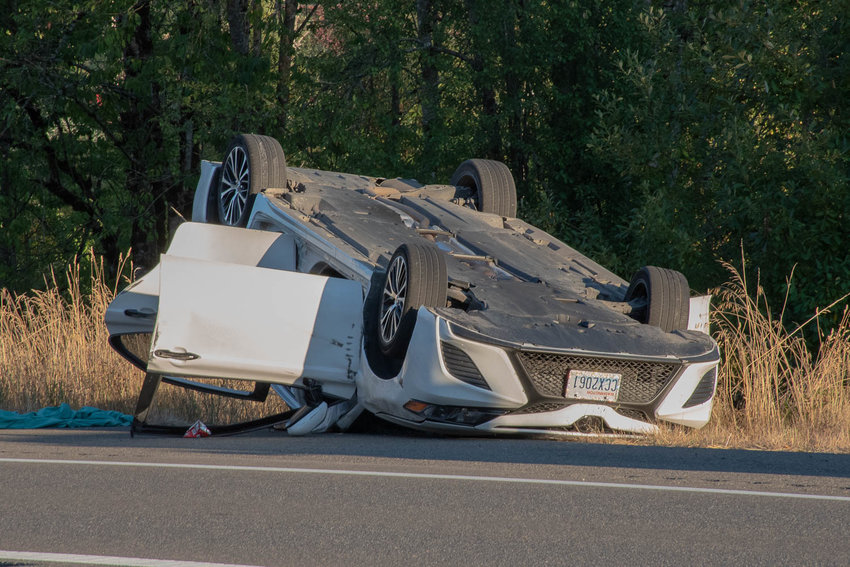 A car sits flipped after getting into an accident with another vehicle early Thursday evening.